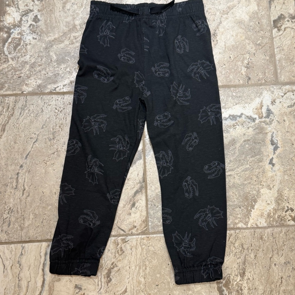 NWOT size 4 Black Kids Jogger Pants with Dinosaurs pattern